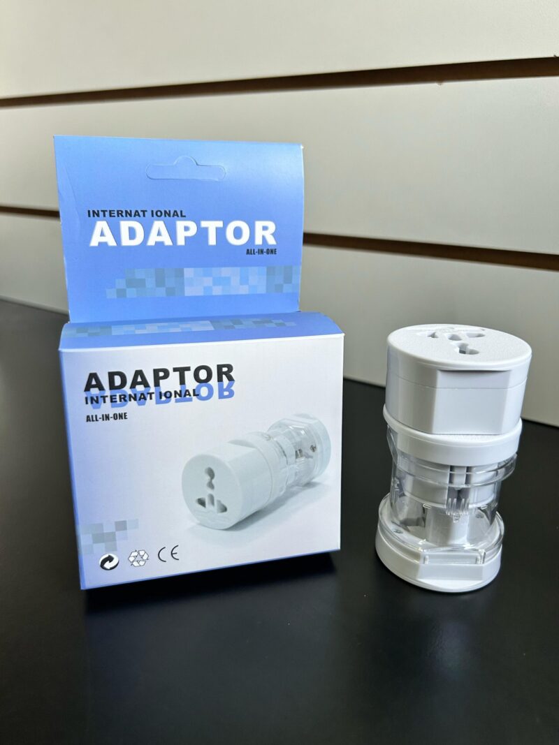 1075 - ADAPTADOR INTERNACIONAL CAJA CELESTE REDONDO